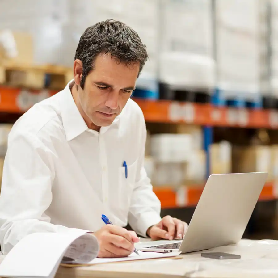 Supervisor working in a warehouse.